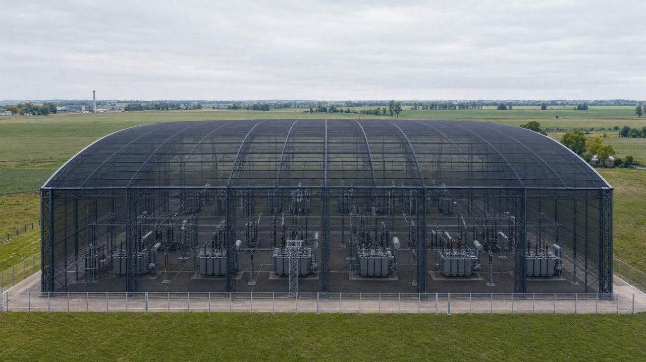 A completed HelixHold enclosure over a substation, foundations, frame and netting as one system